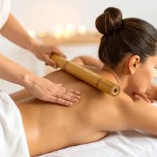 Full Body Warm Bamboo Therapy session at Aura International Thai Spa